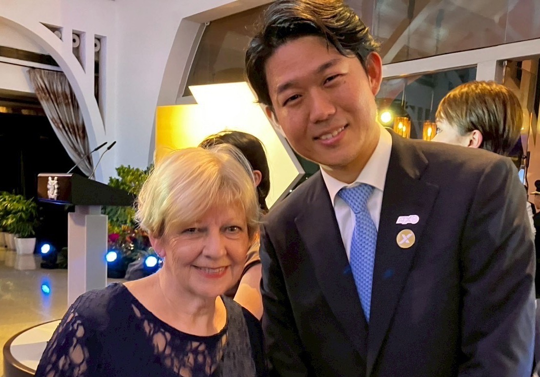 Parliamentary Under-Secretary of State for the Future Digital Economy and Online Safety Jones on the left, and Vice-Minister Kishi on the right.