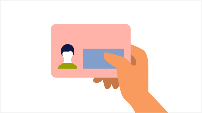 マイナンバーカードを持つイラスト