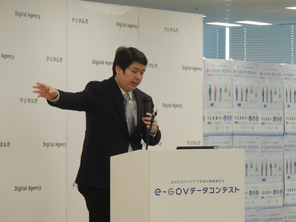 A photograph of a student giving a presentation