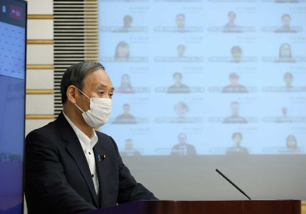 Prime Minister SUGA Yoshihide at the launch ceremony remotely from his official residence.