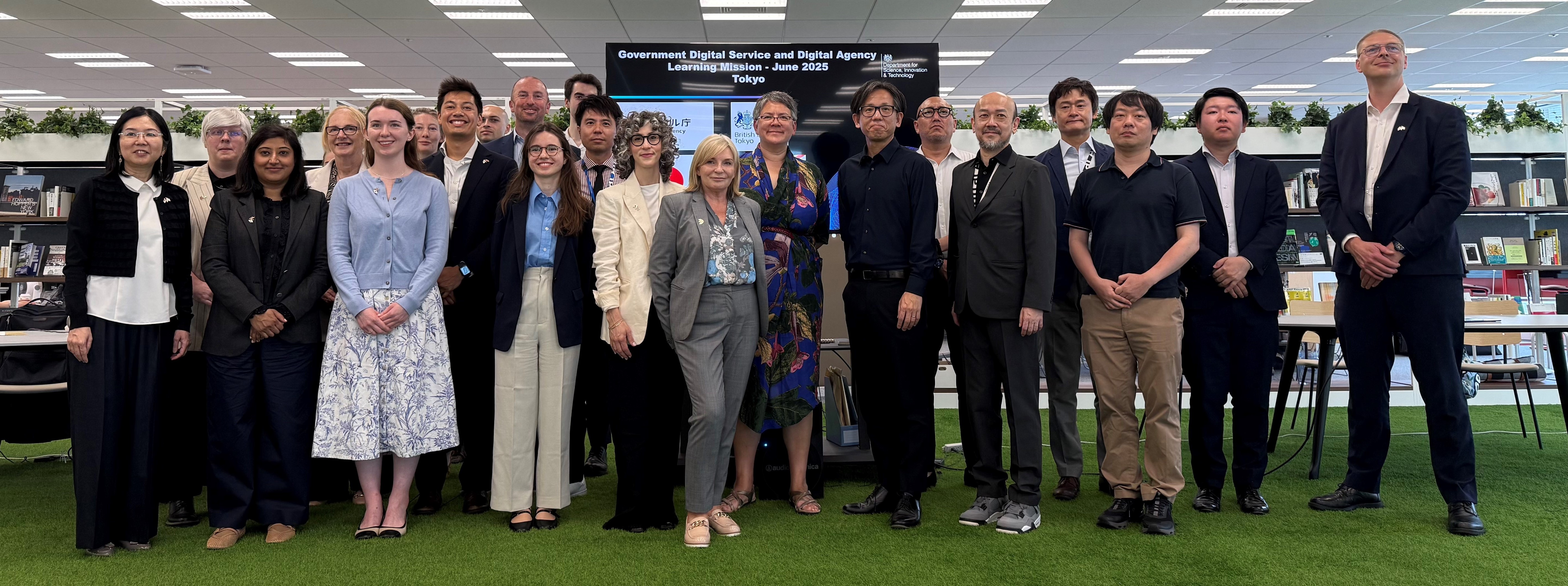 Group photo features the delegations from the UK on the left, the Digital Agency team on the right, and Vice-Minister Asanuma standing in the center.